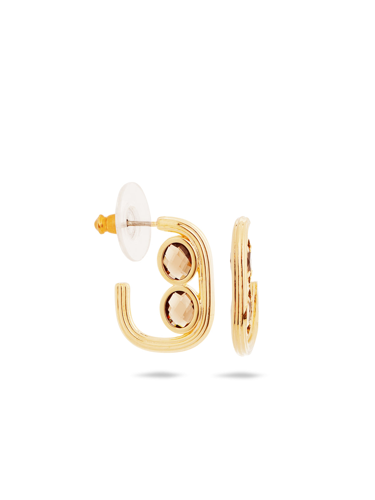 Gold hoop earrings and faceted glass